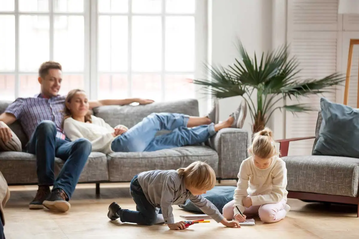 Family relaxing together in their living room