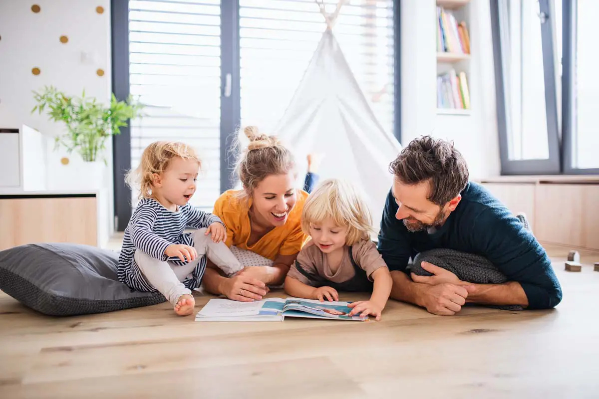 Family reading together at home