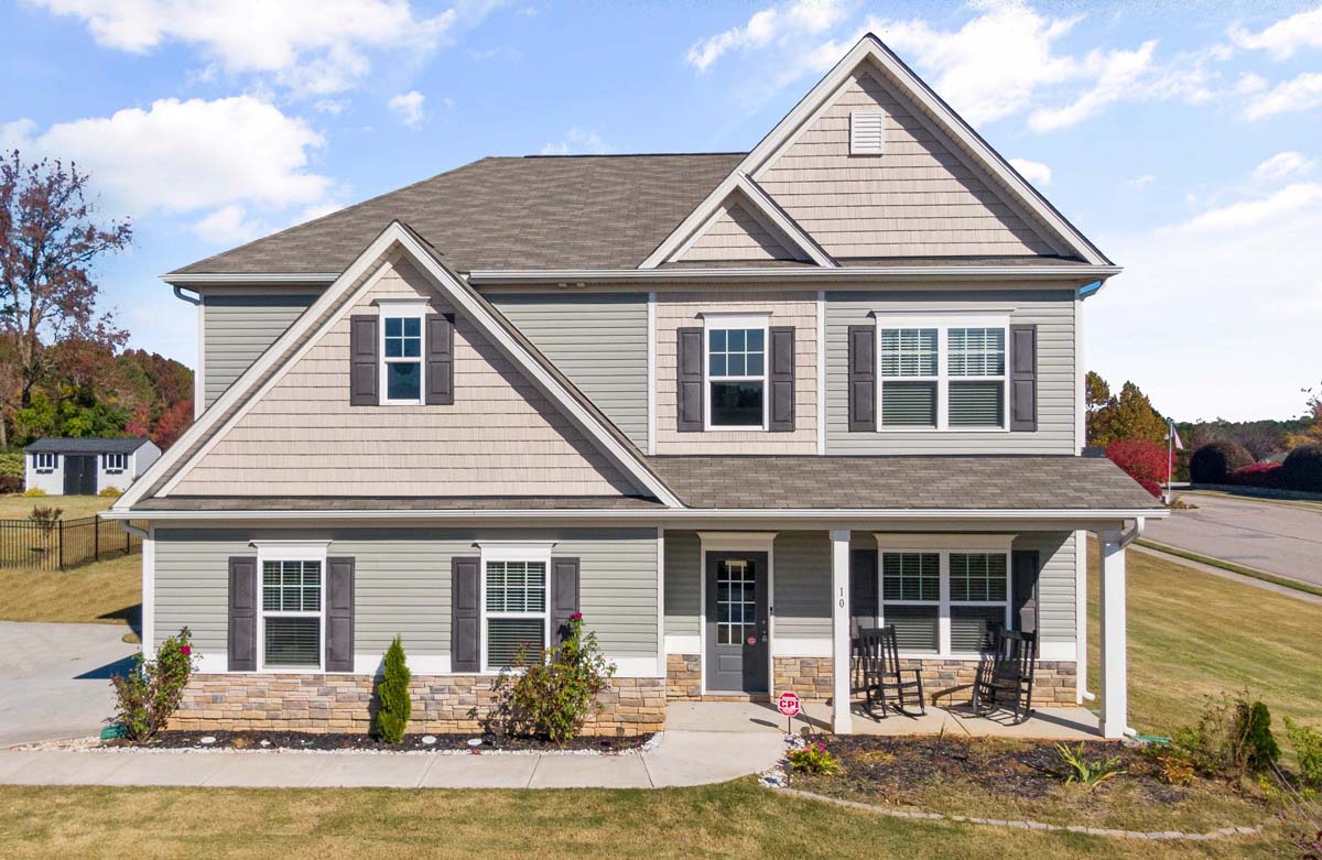 Tan and grey two-story home